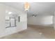 Open concept living room and kitchen space with modern lighting at 923 Lexington Pkwy # 14, Apopka, FL 32712