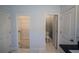 Bathroom featuring walk-in closet, and a separate toilet room at 1114 Turquoise Waves Cv, Kissimmee, FL 34747