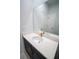 Bathroom vanity featuring a white countertop and brushed gold hardware at 1114 Turquoise Waves Cv, Kissimmee, FL 34747