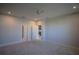 Spacious bedroom featuring new carpet, ceiling fan, and multiple doors at 1114 Turquoise Waves Cv, Kissimmee, FL 34747