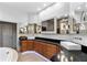 Modern bathroom features dual vessel sinks, under cabinet lighting and wooden cabinets at 1384 E Lake Shore Blvd, Kissimmee, FL 34744