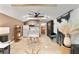 Bright living area showcases a well-appointed kitchenette, comfortable seating, and stylish decor at 1384 E Lake Shore Blvd, Kissimmee, FL 34744