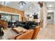 Bright open living area with seamless indoor-outdoor flow, contemporary furnishings, and a view of the pool at 1384 E Lake Shore Blvd, Kissimmee, FL 34744