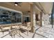 A spacious lanai area perfect for entertaining offers comfortable seating and an outdoor kitchen at 1384 E Lake Shore Blvd, Kissimmee, FL 34744