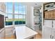Charming view from the playroom with a table and a view of the yard at 1384 E Lake Shore Blvd, Kissimmee, FL 34744