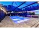 Stunning screened-in pool with clear blue water and outdoor seating areas, perfect for relaxation and entertaining at 1384 E Lake Shore Blvd, Kissimmee, FL 34744