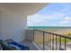 Balcony view featuring an oceanfront view with chair and railing at 1415 Ocean Shore Blvd # 704, Ormond Beach, FL 32176