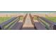 A wooden walkway with benches that leads to the sandy beach and ocean at 1415 Ocean Shore Blvd # 704, Ormond Beach, FL 32176