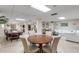 An expansive community room featuring multiple seating and dining areas at 1415 Ocean Shore Blvd # 704, Ormond Beach, FL 32176