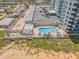 Aerial shot of a pool area near the beach at 1415 Ocean Shore Blvd # 704, Ormond Beach, FL 32176