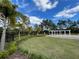 Well maintained community lawn and patio with landscaping at 15491 Lebeau Loop, Winter Garden, FL 34787