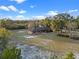 Aerial view of the ranch style home and surrounding landscape at 1650 Cypress Ave, Orange City, FL 32763