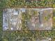 Aerial view of an expansive property, marked with a red boundary line showcasing the land at 1650 Cypress Ave, Orange City, FL 32763