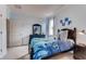 Charming bedroom with surf themed decor, carpet floors and natural light at 1700 Three Bars Rd, Kissimmee, FL 34744