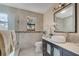 Luxurious bathroom with a vessel sink, dark wood vanity and a glass shower at 1775 Druliner Rd, St Cloud, FL 34771
