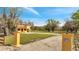 Exterior view of home from entrance showing the driveway and green surroundings at 1775 Druliner Rd, St Cloud, FL 34771
