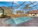 Relaxing screened-in pool area with brick pavers, ideal for outdoor entertaining and enjoyment at 1775 Druliner Rd, St Cloud, FL 34771