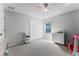 Light bedroom with white dresser and closet at 2564 Bullion Loop, Sanford, FL 32771