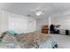 Comfortable bedroom with ceiling fan, carpet, and ample closet space at 2564 Bullion Loop, Sanford, FL 32771
