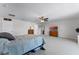 Bright, spacious bedroom featuring a ceiling fan and TV at 2564 Bullion Loop, Sanford, FL 32771