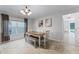 Bright dining area featuring a modern table and chairs at 2564 Bullion Loop, Sanford, FL 32771