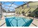 Backyard pool area featuring clear blue water, a hot tub and pool-side patio at 2564 Bullion Loop, Sanford, FL 32771