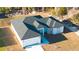 New home with a modern roof design, two-car garage, and landscaped front yard at 2629 Sw 163Rd Pl, Ocala, FL 34473