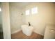 Modern bathroom featuring a freestanding tub, a walk-in shower with white marble tile, and natural light at 2629 Sw 163Rd Pl, Ocala, FL 34473