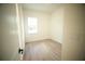 Bright bedroom features a window and light wood-look flooring at 2629 Sw 163Rd Pl, Ocala, FL 34473