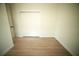 Empty bedroom with closet and light wood-look flooring at 2629 Sw 163Rd Pl, Ocala, FL 34473