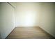 Bedroom with closet and light wood-look flooring at 2629 Sw 163Rd Pl, Ocala, FL 34473
