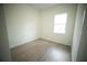 Clean bedroom with light wood flooring and natural light at 2629 Sw 163Rd Pl, Ocala, FL 34473