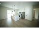 Stylish kitchen featuring an island, stainless steel appliances, and light wood flooring at 2629 Sw 163Rd Pl, Ocala, FL 34473