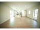 Spacious living room featuring an island and light wood flooring at 2629 Sw 163Rd Pl, Ocala, FL 34473