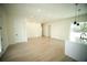 Spacious open-concept living room and kitchen area with plenty of natural light and modern finishes at 2629 Sw 163Rd Pl, Ocala, FL 34473