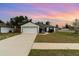 Charming single-story home boasting a well-maintained lawn, inviting entrance, and two-car garage at 2840 Staten Dr, Deltona, FL 32738