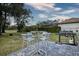 Outdoor area with a dining set and grill at 4178 S Chickasaw Trl, Orlando, FL 32829