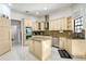 Spacious kitchen featuring granite countertops, stainless steel appliances, and a large island at 4178 S Chickasaw Trl, Orlando, FL 32829