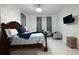 Spacious main bedroom features a large bed, sitting area, and modern decor at 4178 S Chickasaw Trl, Orlando, FL 32829