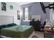 Bedroom with modern furniture, bright window, TV and desk at 429 Ohio Way, Kissimmee, FL 34759