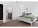 Bright bedroom featuring a bed, ensuite bathroom, and a large closet at 429 Ohio Way, Kissimmee, FL 34759