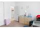 Bright bedroom features modern furnishings and decor, creating a cozy atmosphere at 429 Ohio Way, Kissimmee, FL 34759