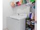 Laundry room with washer, dryer, and storage, maximizing convenience at 429 Ohio Way, Kissimmee, FL 34759