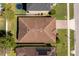 Aerial view of a single Gathering home showcasing the roof, driveway, backyard and surrounding landscaping at 4605 Kalispell Rd, Kissimmee, FL 34758