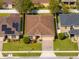 A clean aerial view of a single Gathering home in a manicured lawn community at 4605 Kalispell Rd, Kissimmee, FL 34758