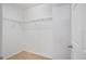 Walk in closet with carpeted floor and metal shelving at 4605 Kalispell Rd, Kissimmee, FL 34758