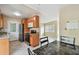 Well-equipped kitchen features granite countertops, stainless steel appliances, and ample cabinet space at 4900 Kempston Dr, Orlando, FL 32812