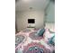 Nicely decorated bedroom with queen bed, dresser, and colorful bedding at 5356 Oakbourne Ave, Davenport, FL 33837