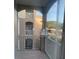 View from the balcony featuring white railings and views of the building across the way at 586 Brantley Terrace Way # 201, Altamonte Springs, FL 32714