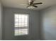 Bedroom featuring wood floors and a window at 586 Brantley Terrace Way # 201, Altamonte Springs, FL 32714